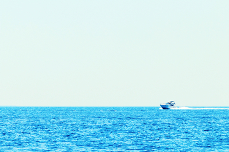 Luxury motor boat cruising in blue sea, Summer vacationの写真素材
