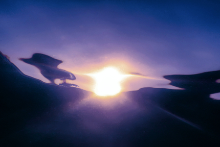 Underwater Sunset water surfaceの写真素材