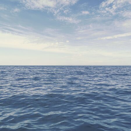 Blue Ocean, Water Surface and Blue Skyの写真素材