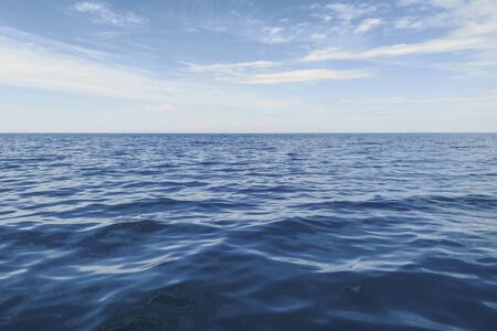 Blue Ocean, Water Surface and Blue Skyの写真素材