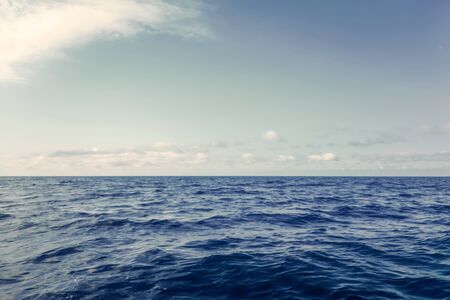 Blue Ocean, Water Surface and Blue Skyの写真素材