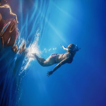 Women Snorkeling in the Tropical Sea, Underwater Womenの写真素材