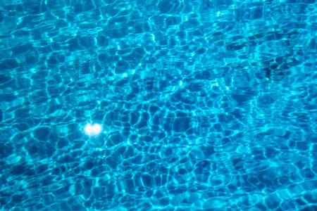 Swimming Pool water. Ripple Water. Sun Reflection background.