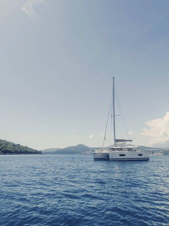Sailing Yacht Catamaran in the Tropical Sea, Yachting, Luxury Sailing の写真素材
