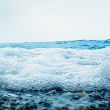 Soft Wave of Blue Ocean on Sandy Beach Background, Conceptual Image