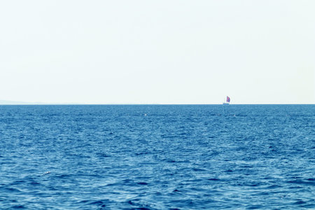 Distant sail boat on the sea, Summer vacation
