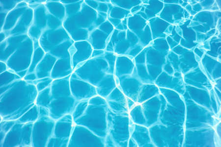 Blue Ripple Water Background,Â Swimming Pool Water Sun ReflectionÂ の写真素材