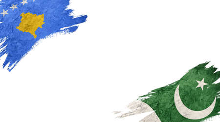 Flags of Kosovo and Pakistan on white backgroundの写真素材