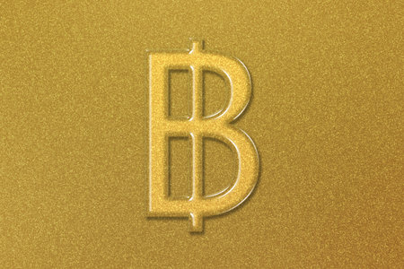 Thai Baht, THB Baht currency, Monetary currency symbol, gold backgroundの写真素材