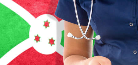 Burundi flag female doctor with stethoscope, national healthcare systemの写真素材
