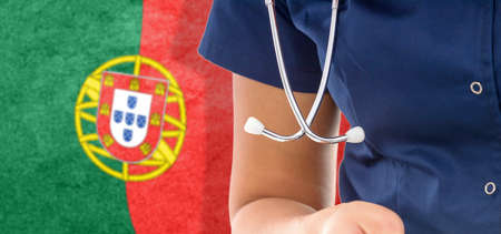 Portugal flag female doctor with stethoscope, national healthcare systemの写真素材