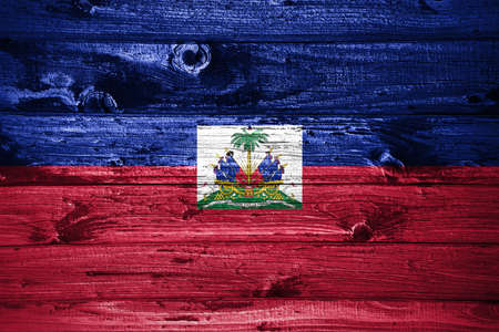 Haiti flag on wooden planks background wood flagの写真素材