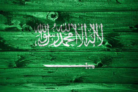 Saudi Arabia flag on wooden planks background wood flagの写真素材