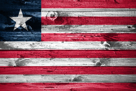 Liberia flag on wooden planks background wood flagの写真素材