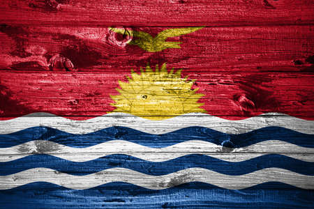 Kiribati flag on wooden planks background wood flagの写真素材