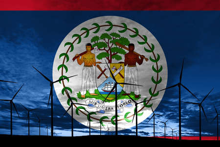 Belize flag wind farm at sunset, sustainable development, renewable energy Wind Turbinesの写真素材