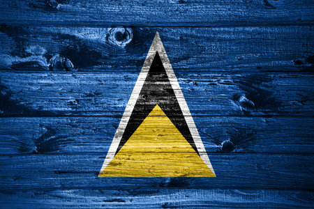 Saint Lucia flag on wooden planks background wood flagの写真素材