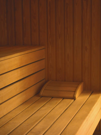 Wooden sauna interior wood fired sauna with bucketの写真素材