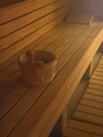 Wooden sauna interior wood fired sauna with bucketの写真素材