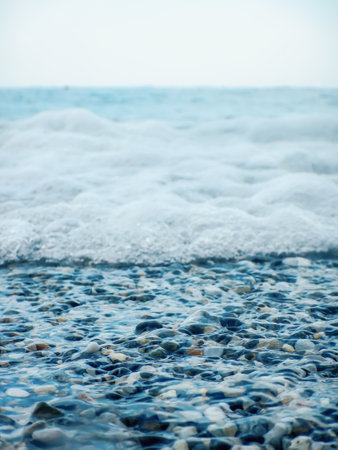 Soft Wave of Blue Ocean on Beach Backgroundの写真素材