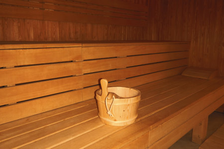Wooden sauna interior wood fired sauna with bucketの写真素材