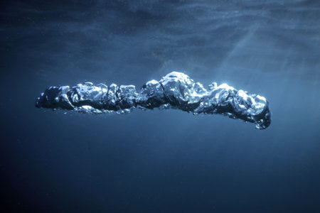 Bubble Ring Underwater Ascends Towards The Sun