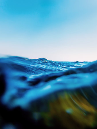 Sea wave close up, low angle view water backgroundの写真素材