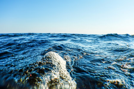 Sea wave close up, low angle view water backgroundの写真素材