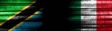 Tanzania and Italy Flags on Black Backgroundの写真素材