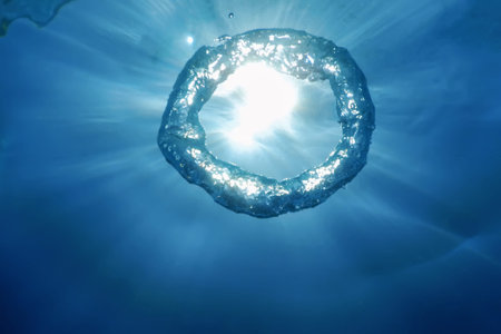 Underwater Bubble Ring Ascends towards the Sun