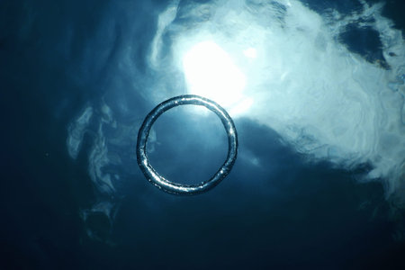 Bubble Ring Underwater Ascends Towards The Sun