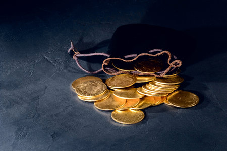 Austrian Gold Ducats in Leather Pouch on Black Background, Franz Joseph