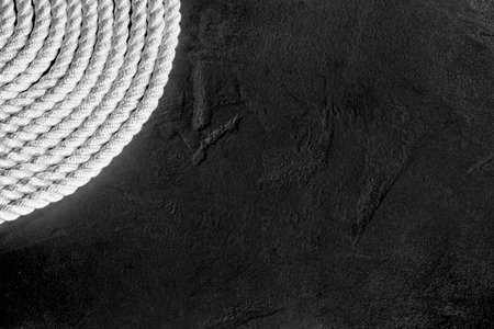 White Rope at Black Background Top View, With Copy Spaceの写真素材