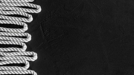White Rope at Black Background Top View, With Copy Space