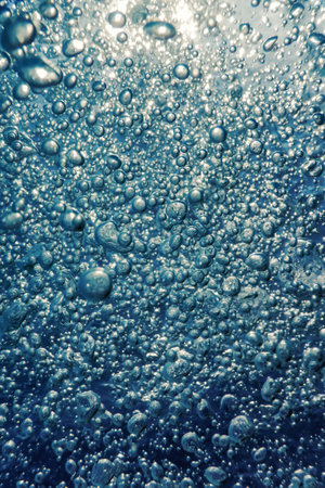 Underwater Air Bubbles with sunlight, Background Bubblesの写真素材