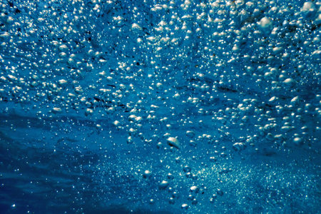 Underwater Air Bubbles with sunlight, Background Bubblesの写真素材