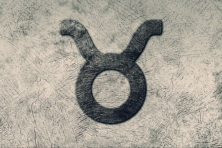 Taurus Zodiac Black Grunge Sign on Light Gray Background
