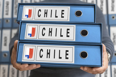 Chile Administrative Files, Hands Holding Foldersの写真素材