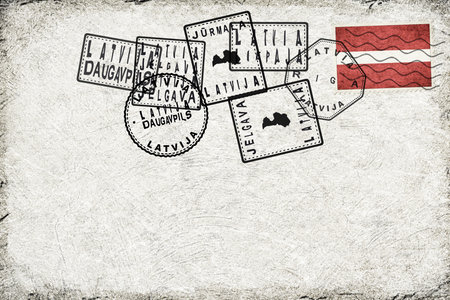 Latvia Vintage Postcard with Flag Stamp and City Postmarksの写真素材