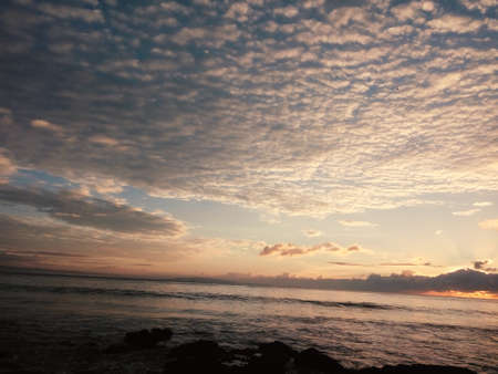 Pangandaran is one of West Javaâs best kept-secrets as far as international tourists are concerned. Pangandaran offers uniquely black and white sand, calm waved beaches and spectacular sunの写真素材