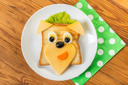 sandwich with cheese and quail eggs on wooden backgroundの写真素材