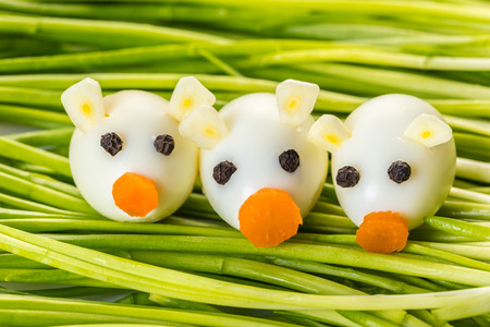 Children food, little pigs of quail eggs