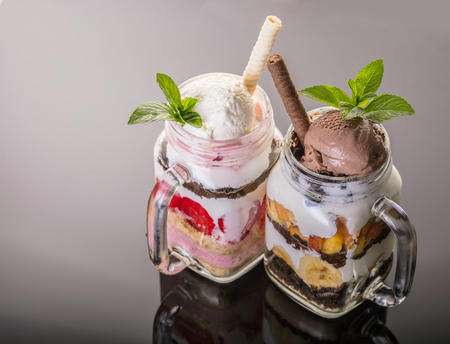 Fruit dessert with ice cream in a glass jarの写真素材