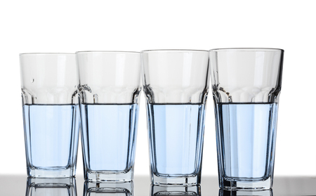 Glasses with clear water on a white backgroundの写真素材