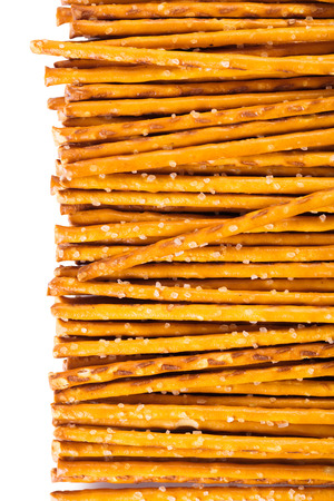 Food background from a texture of salted straws 