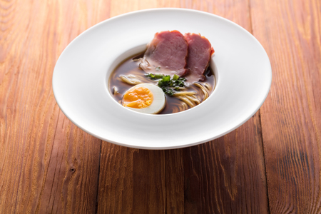 Asian food, noodle soup on wooden backgroundの写真素材