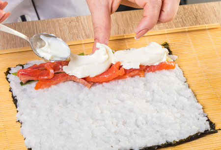 Japanese chef. Chef prepares rolls, hands closeupの写真素材