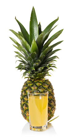 pineapple juice in a glass on white isolated backgroundの写真素材