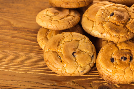 fresh pastry, coconut biscuits on a wooden background