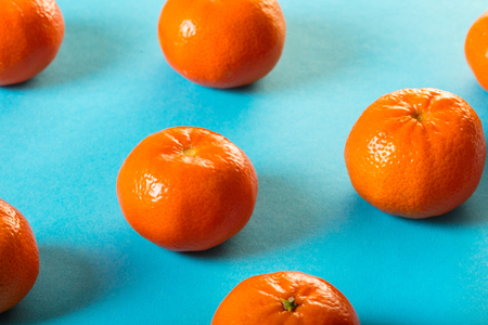 food background, tangerines on blueの写真素材